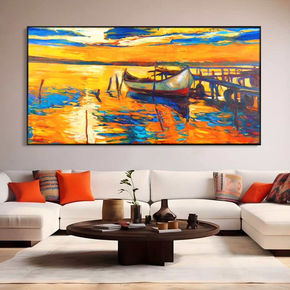 Tablou canvas cu pictura cu barca la apus, in rama de aluminiu negru, pe perete intr-un living